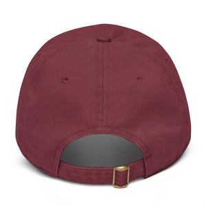 Back view of maroon adjustable cotton dad hat with brass buckle closure