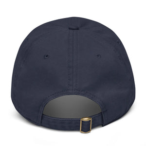 Navy blue baseball cap back view with adjustable strap and brass buckle