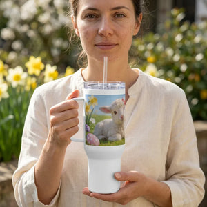 Woman holding a white tumbler with a spring lamb and Easter eggs design outdoors