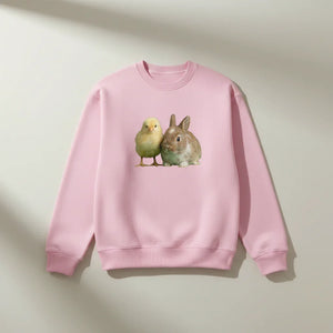 Pink crewneck sweatshirt with chick and bunny graphic, cozy animal print apparel
