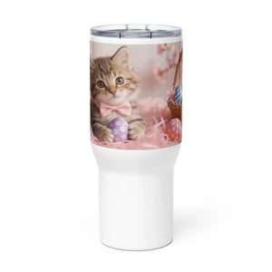 White travel mug with cute kitten, pink bow, and Easter eggs on pink background
