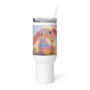 White travel mug with handle, featuring cute bunny holding decorated Easter egg illustration