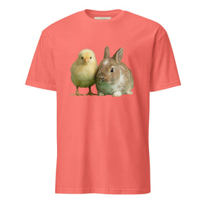 Coral pink unisex t-shirt featuring a chick and bunny graphic on the front