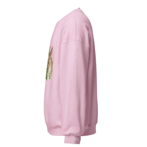 light pink unisex crew neck sweatshirt with cute bunny graphic on front, left side view