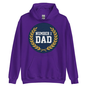 Purple unisex hoodie with 'Number 1 Dad' text and gold laurel graphic on the front