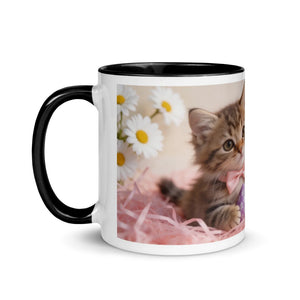 White ceramic mug with black handle, featuring kitten with pink bow and daisies design