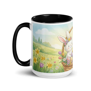 White ceramic mug with black interior, featuring a cute bunny in a flower field design