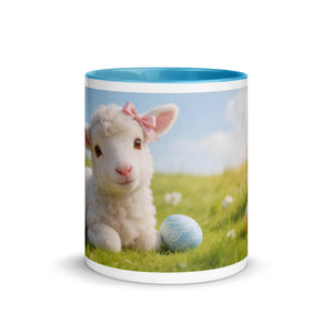 White ceramic mug with blue interior featuring a cute lamb with pink bow and Easter egg design
