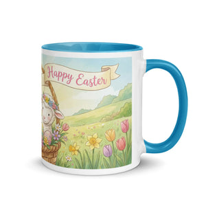 White ceramic mug with blue handle and rim, featuring a spring floral Easter lamb design and Happy Easter text
