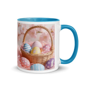 White ceramic mug with blue handle and interior, Easter egg basket design on side