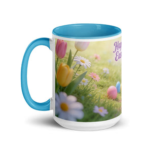 White ceramic mug with blue handle and interior, featuring spring flowers and Easter eggs design