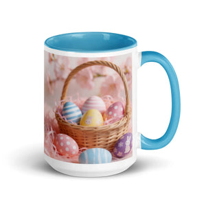White ceramic mug with blue handle, featuring a basket of colorful Easter eggs design.