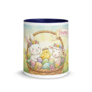 White ceramic mug with dark blue interior, featuring an Easter basket with bunny, chick, lamb, and decorated eggs.