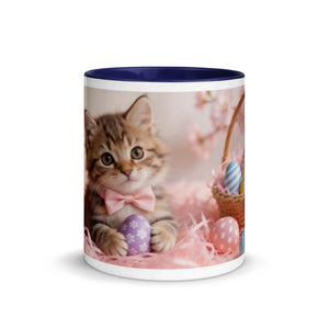 White ceramic mug with dark blue interior, featuring a kitten with bow tie and Easter eggs design