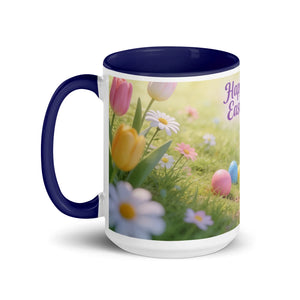 White ceramic mug with dark blue handle and interior, featuring a spring floral and Easter egg design.