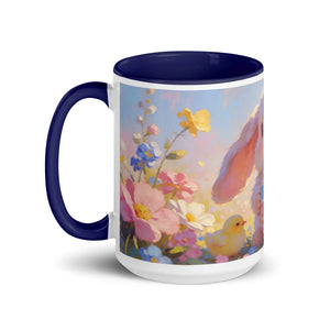 White ceramic mug with dark blue handle and rim, featuring a bunny, chick, and pastel flowers.