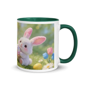 White ceramic mug with green handle, featuring cute bunny with Easter eggs and spring flowers