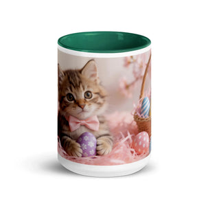White ceramic mug with dark green interior, featuring a cute kitten with a pink bow and Easter eggs