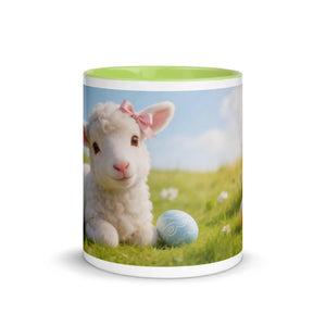 White ceramic mug with green interior, featuring a cute lamb with pink bow and Easter egg on grass