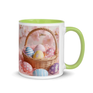 White ceramic mug with green interior and handle, featuring an Easter basket with colorful eggs