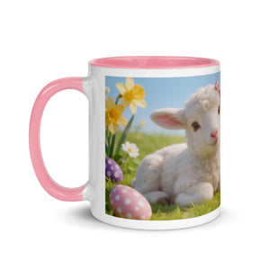 White ceramic mug with pink handle and interior, featuring a lamb, Easter eggs, and spring flowers.