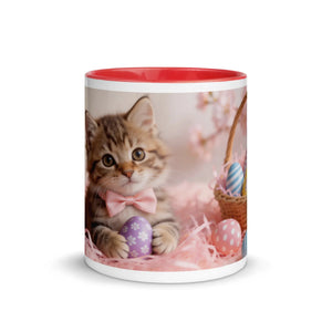 White ceramic mug with red interior featuring a kitten, pink bow tie, and Easter eggs design
