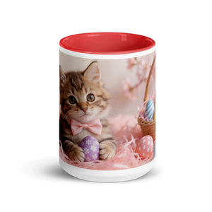 White ceramic mug with red interior featuring a kitten with a pink bow and Easter eggs