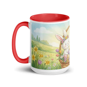 White ceramic mug with red handle and interior, featuring a cute bunny, spring flowers, and Easter eggs in a colorful meadow illustration.