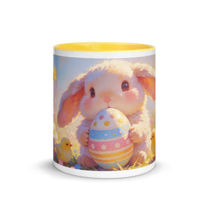 White ceramic mug with yellow interior, featuring a cute bunny holding a colorful Easter egg.