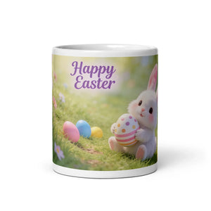 White ceramic mug featuring a cute Easter bunny with colorful eggs and Happy Easter text
