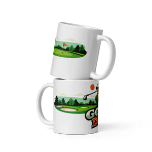 Stacked white ceramic mugs with golf-themed green and flag illustrations