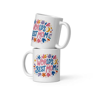 Two white mugs with colorful 'World's Best Mom' floral design stacked together
