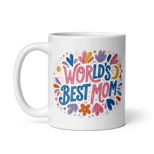 White ceramic mug with colorful 'World's Best Mom' text and floral design, handle on left.