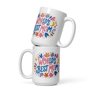 Two white ceramic mugs with colorful World's Best Mom design and floral accents