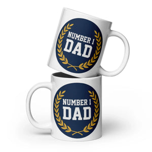 White ceramic mug with Number 1 Dad blue and gold laurel design, front view