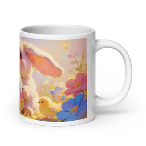 White glossy mug featuring a cute bunny, yellow chick, and colorful spring flowers illustration