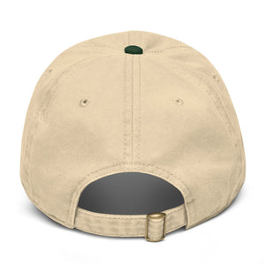 Back view of a khaki baseball cap with green button and adjustable strap