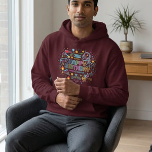 Man wearing maroon gamer birthday hoodie with colorful video game graphics