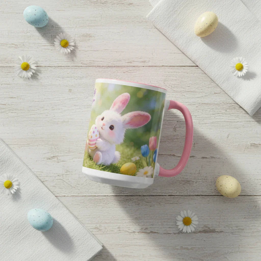 Easter mug with cute bunny and pastel eggs on white wood table with daisies and candy eggs