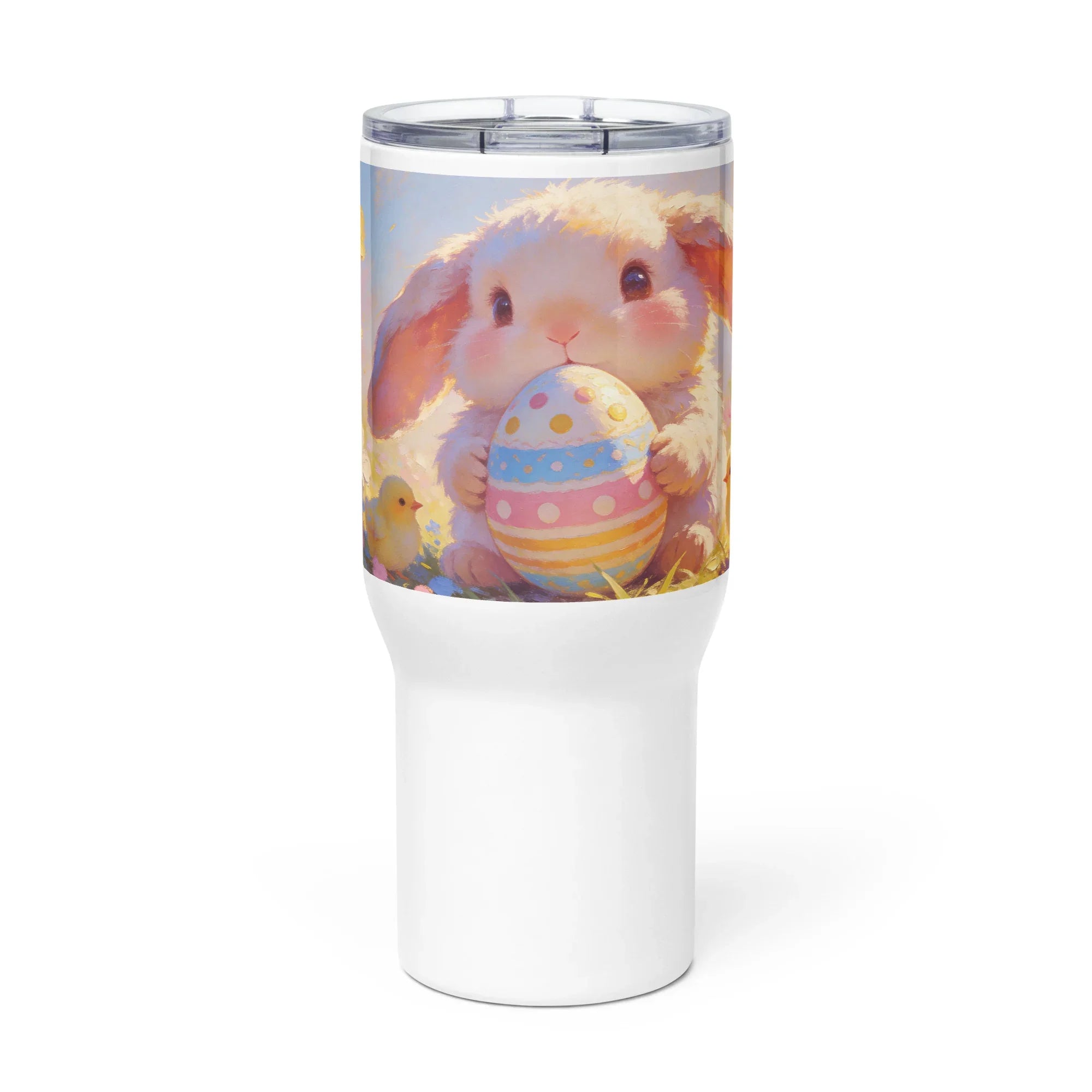 White travel mug with handle featuring a cute bunny holding a decorated Easter egg