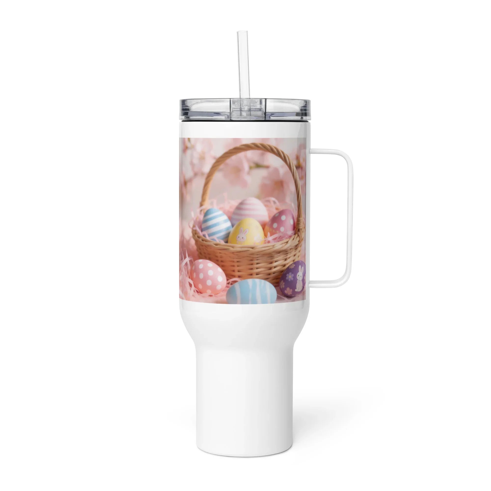 White travel mug with handle featuring a basket of colorful Easter eggs design
