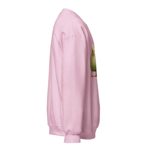 Light pink unisex crew neck sweatshirt with a cute duck graphic on the front, side view