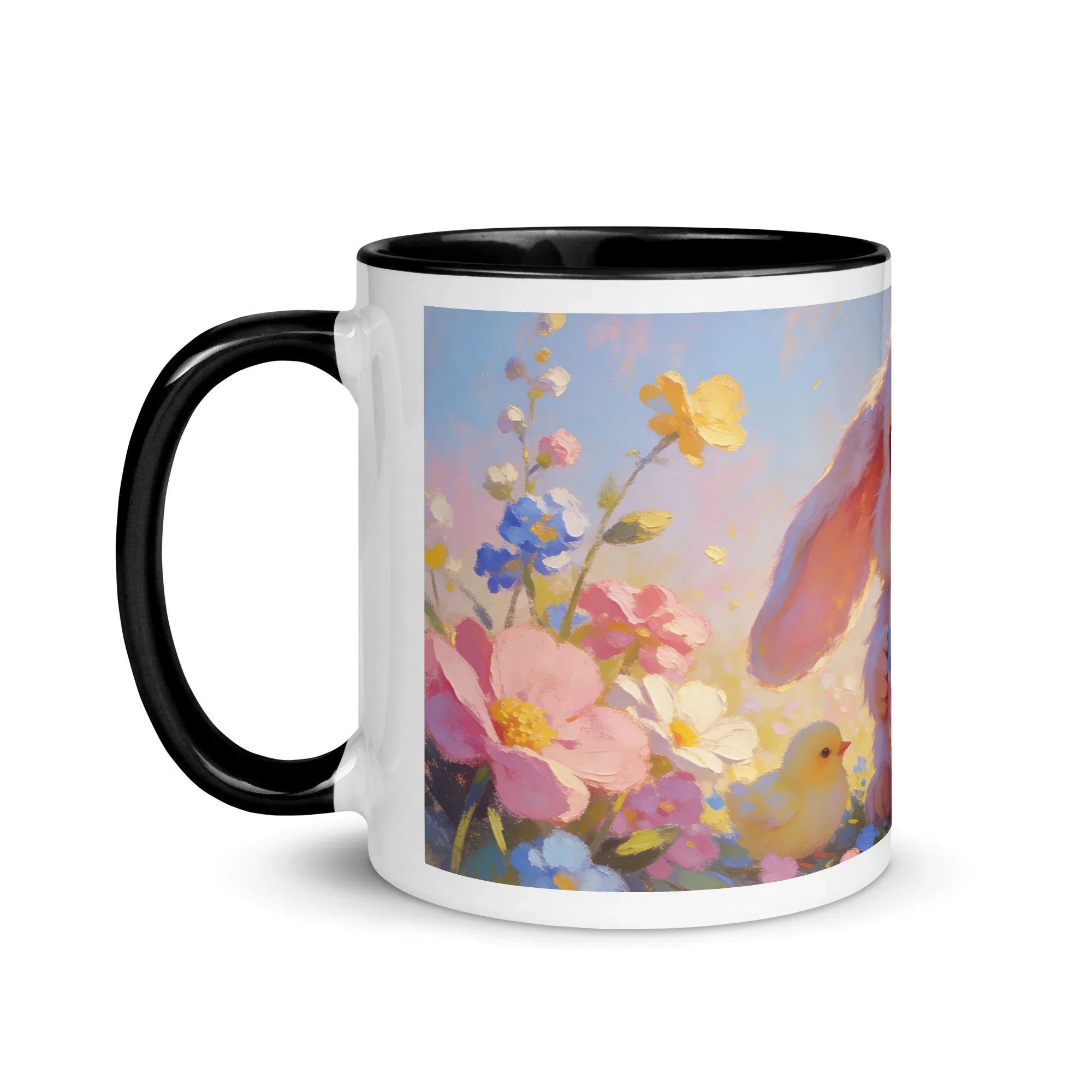 White ceramic mug with black handle, featuring an illustrated bunny, flowers, and chick