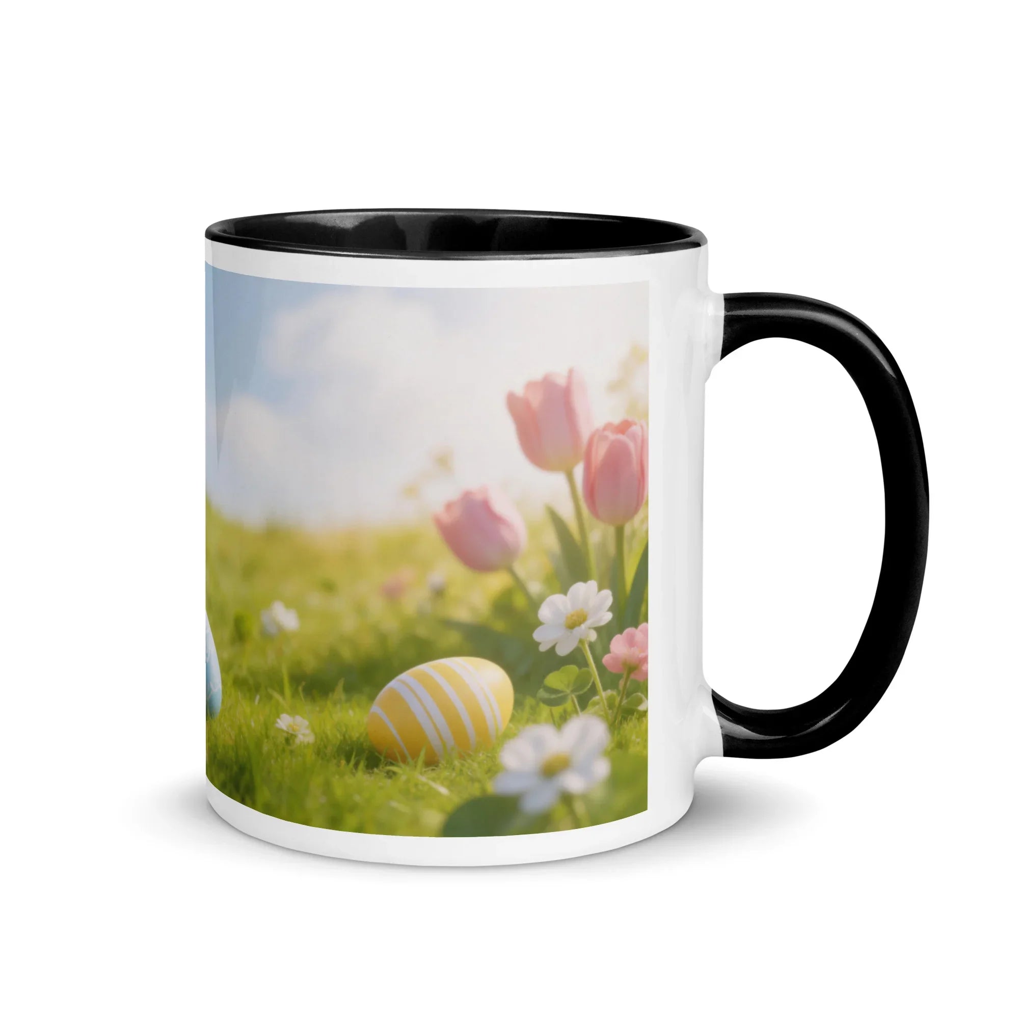White ceramic mug with black handle and rim, featuring spring flowers and Easter egg design