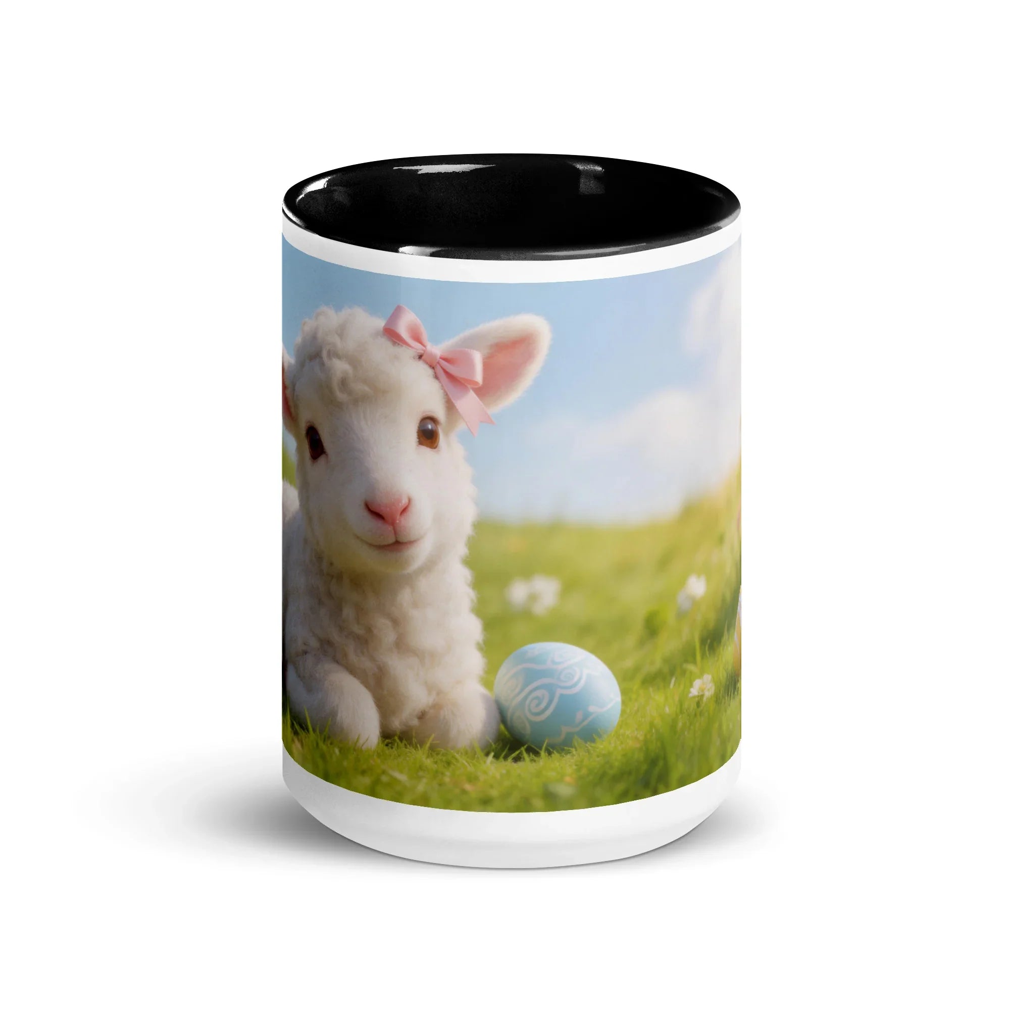 White ceramic mug with black interior featuring a lamb with pink bow and Easter egg on grass