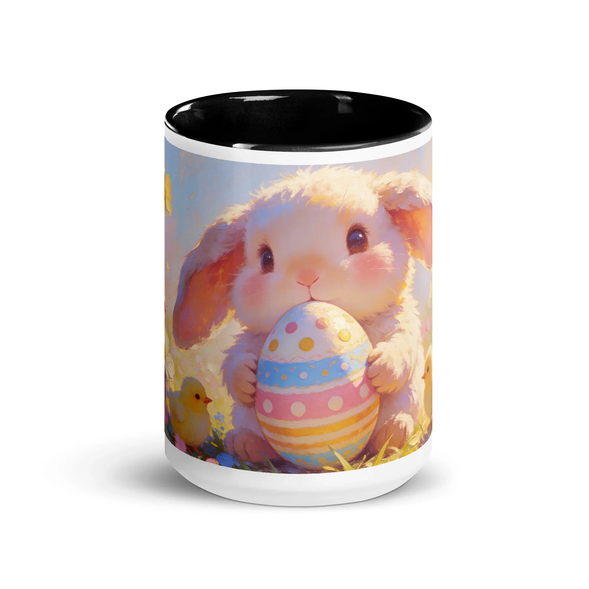 White ceramic mug with black interior featuring a cute bunny holding a colorful Easter egg.