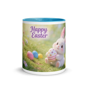 White ceramic mug with blue interior, featuring a cute Easter bunny, colored eggs, and 'Happy Easter' text.