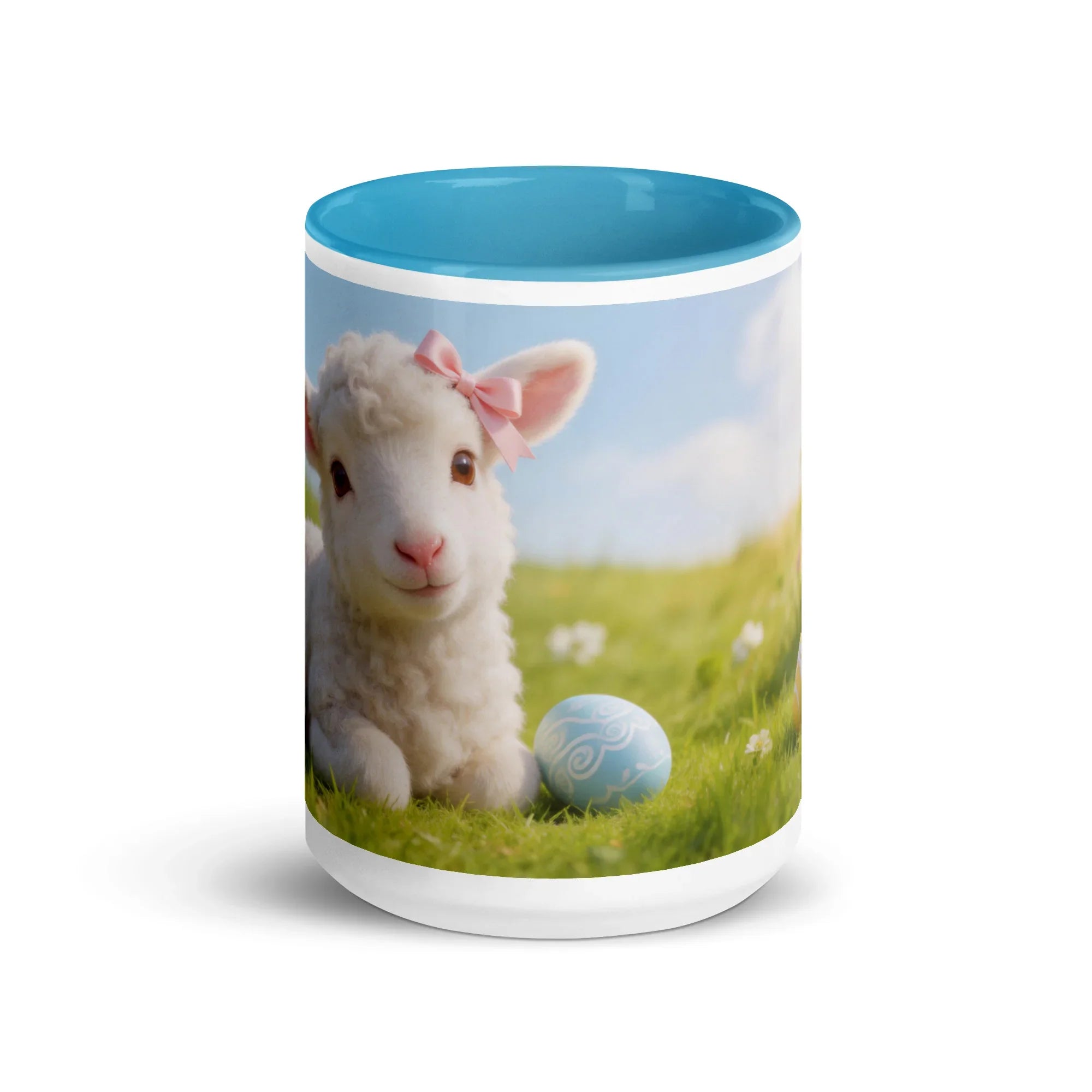 White ceramic mug with blue interior featuring a cute lamb with pink bow and Easter egg design