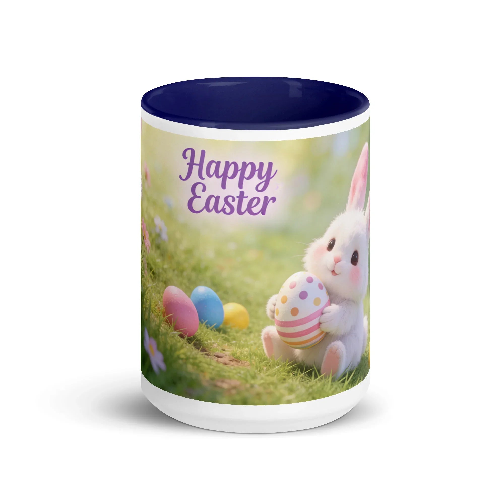 White ceramic mug with dark blue interior, featuring a cute Easter bunny, colorful eggs, and 'Happy Easter' text.