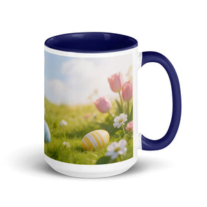White ceramic mug with dark blue handle and interior, floral and Easter egg design
